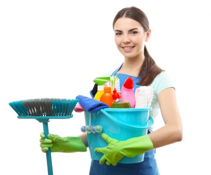 Cleaner vacuuming a carpet in a tidy Ruislip house